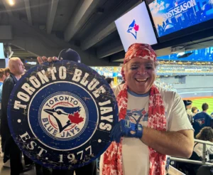 Fan Geoffrey Fulton poses with his Blue Jays gear: AP PhotoRob Gillies