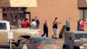 A screengrab showing students exiting the Tumbler Ridge school after deadly shootings in British Columbia, Canada, on Feb 10, 2026. (Image: AP/Jordon Kosik)